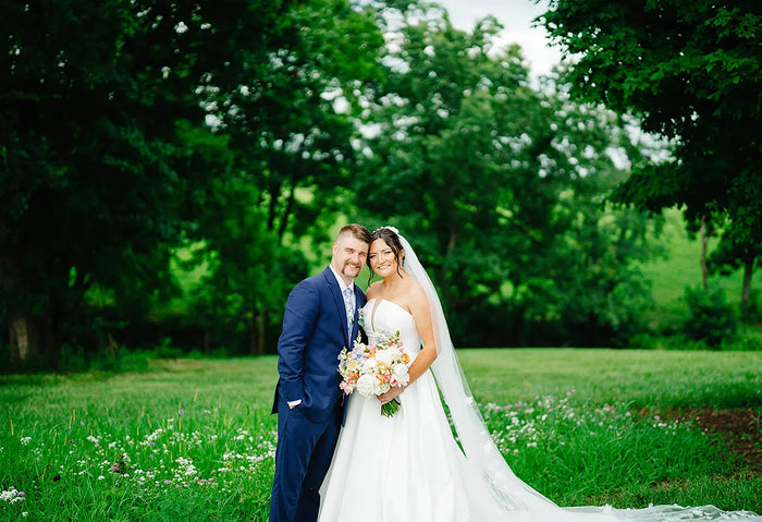 Real Bride Abbie's Blue and Gold Floral Farm Wedding in the REESE Gown | Eddy K Bride